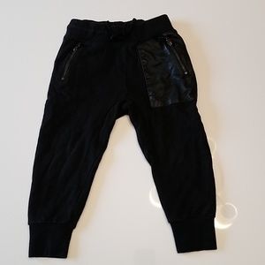 Koala Kik black cotton and leather skull pants